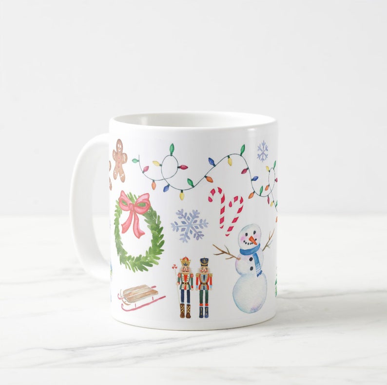 May include: White ceramic mug with a colorful Christmas design. The design features a gingerbread man, a wreath, a snowman, a nutcracker, candy canes, and Christmas lights.