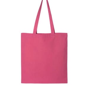 May include: A pink canvas tote bag with two handles. The bag is empty and ready to be filled with items.
