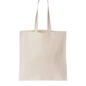 May include: A natural canvas tote bag with two long handles. The bag is empty and has a white background.