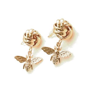 Orecchino a perno con base per strass colore oro 9 x 12 mm