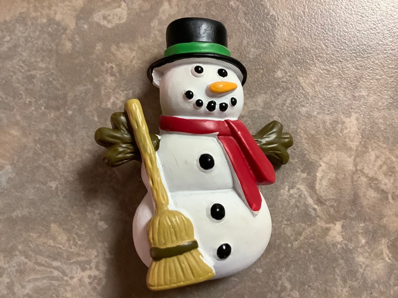 A Snowman Brooch with Pin.
