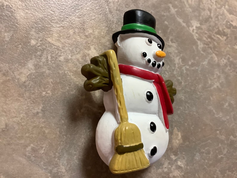 A Snowman Brooch with Pin.