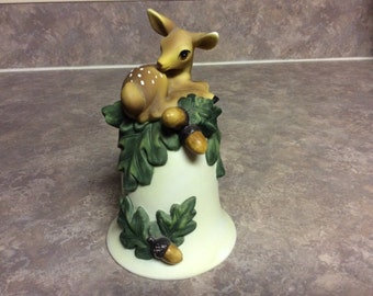 Darling! A Deer on The Top of a Bell with Acorns and Green Leaves.