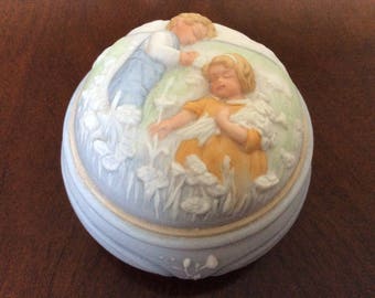 Avon's Golden Dreams Porcelain Music/Trinket Box.