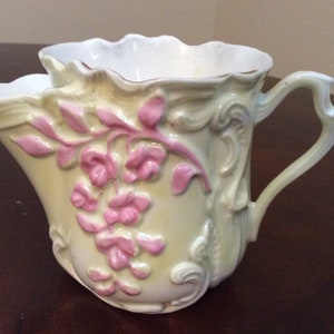 A Pretty Vtg Yellow Shaving Scuttle with a Pink Floral Design.