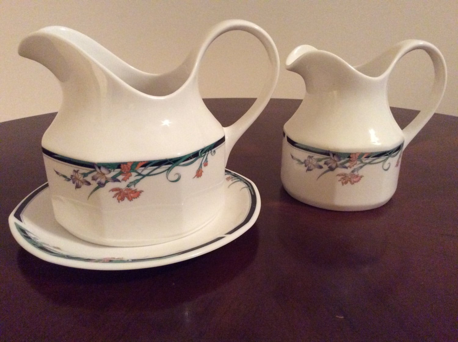 Royal Doulton Exquisite Fine China Three Piece Juno Jugs and a Saucer.