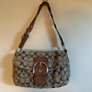 A Coach Soho Signature Pocket Flap, Canvas and Leather Shoulder