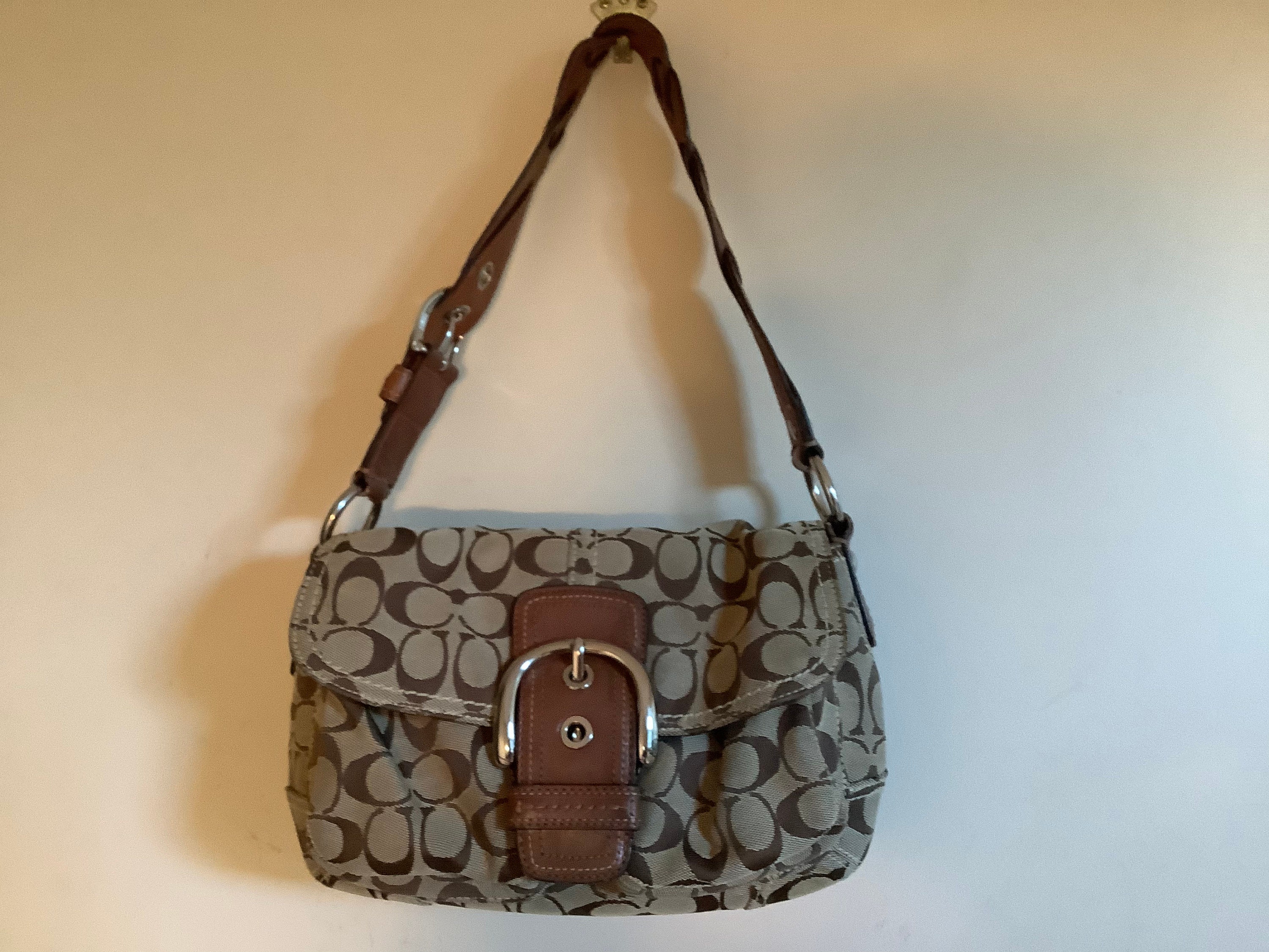 A Coach Soho Signature Pocket Flap, Canvas and Leather Shoulder