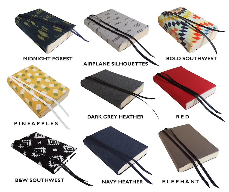 May include: Nine different book covers with various patterns and colors. The covers include a midnight forest design, airplane silhouettes, bold southwest pattern, pineapples, dark grey heather, red, black and white southwest, navy heather, and elephant.
