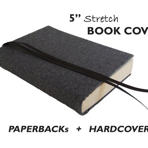 May include: Gray stretch book cover with black elastic straps. 5" Stretch Book Cover. Paperbacks + Hardcovers.
