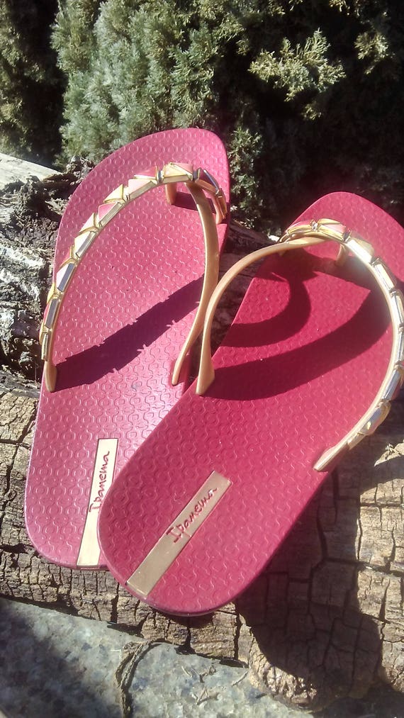 burgundy flip flops