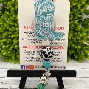 Rodeo Cowboy boot blame it all on my roots badge reel holder