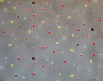 Patchworkstoff grau mit bunten Flecken