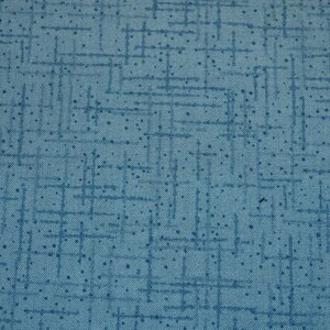May include: A blue fabric with a subtle pattern of white lines and small white dots.