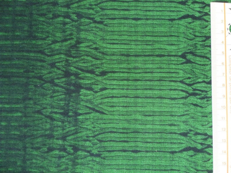 Patchworkstoff grüne Wellen mit schwarz Bild 1
