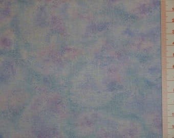 May include: A close-up of a light blue fabric with a subtle white and purple marbled pattern. The fabric has a soft, textured feel.