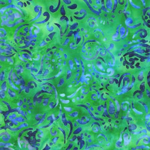 Könnte beinhalten: Grüner und blauer Stoff mit Paisley-Muster. Der Stoff hat einen Batik-Effekt.