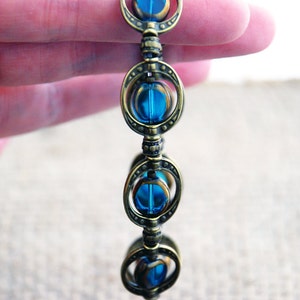 Water of Life Inspired Jewelry: Beaded Bracelet Made of Gold-Edged Blue Glass & Antique Gold Plated Beads
