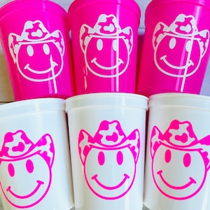 Cowgirl Party Cups - Cowgirl bachelorette party, Cowgirl smile face, Cowgirl party favors, Stadium cups, Cow print, Cow print hat, Hot pink