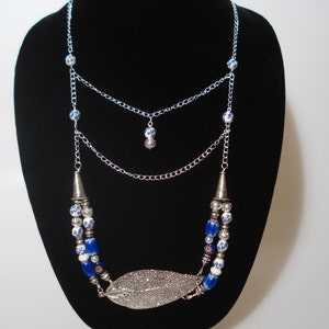 Silver Leaf Pendant Necklace with blue glass beads and more complete with bracelet and earrings or purchase each separately Ships Worldwide