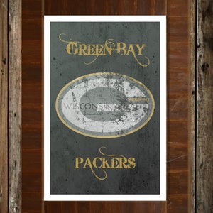 May include: A vintage-style poster with a distressed, green background featuring the Green Bay Packers logo. The logo is a circle with the words "Green Bay" and "Wisconsin" inside. The text "Packers" is below the logo in a gold script font.