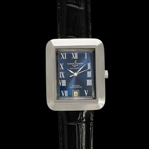 May include: A rectangular silver wristwatch with a blue face and Roman numeral hour markers. The watch has a black leather band and the text "ULYSSE NARDIN AUTOMATIC" is visible on the watch face. The watch also has a date display.