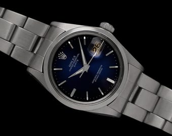 1973 Rolex Oyster Perpetual Date Ref. 1500 Vintage Mens Blue Dial Watch - Stainless Steel