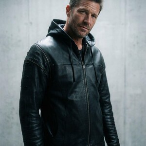 SHREDDED JACKET - littleKINGDesigns - Men’s black cabretta leather jacket with hood, distressed sleeves, ribbed detailing, and front zipper