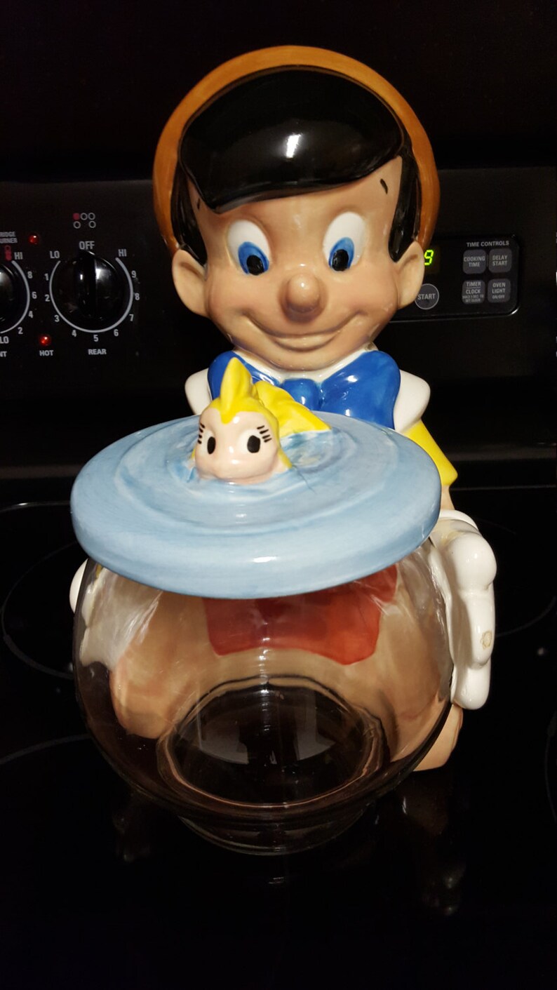 Older Pinocchio Holding His Fish Bowl Cookie Jar Etsy