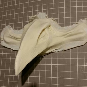 Bird bone beak prosthetic (slip latex)