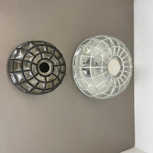 set of 2 &quot;Iron Rings&quot; black white wall Lights by Glashütte Limburg Germany, 1970 midcentury modern midcentury modern