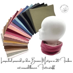 Könnte beinhalten: Eine Auswahl von 20 verschiedenen farbigen Rippstrick-Stoffmustern. Der Stoff ist fächerförmig gefaltet dargestellt. Der Text "Loopschal passend zu den Beanie Mützen in 20 Farben mit auswählbarem Futterstoff" ist am unteren Rand des Bildes sichtbar.