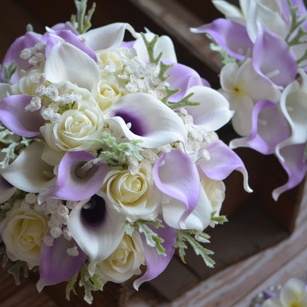 Lilac Bouquets Real touch Lavender Calla Lilies Ivory Plumerias Ivory Roses Dusty Millers Bridesmaids Bouquets Boutonnieres