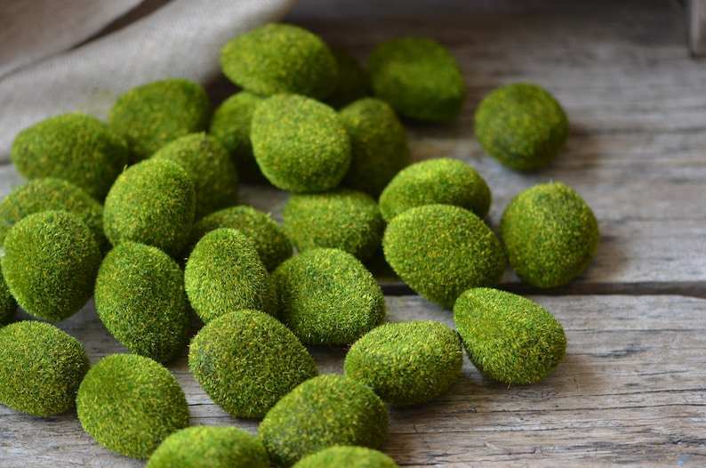 May include: A collection of moss-covered green stones, ideal for adding a touch of nature to your home decor.