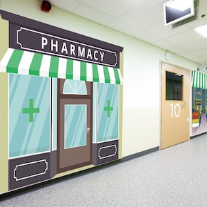 May include: A cartoon illustration of a pharmacy storefront with a green and white striped awning, a sign that reads "PHARMACY", and two windows with green plus signs. The storefront is painted on a wall in a hallway.