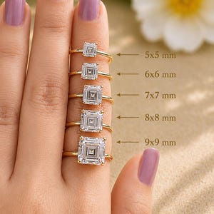May include: Five gold rings with square-cut clear stones arranged in ascending size from 5x5 mm to 9x9 mm. Each ring features a thin gold band and a central stone with a step-cut design, clearly labelled with its specific metric dimensions.