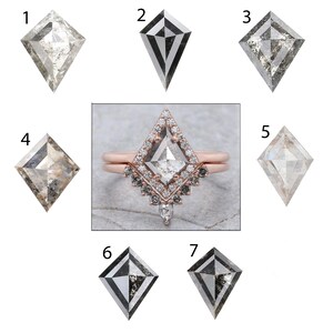 May include: A collection of diamond-shaped gemstones and a rose gold ring with a diamond center stone. The gemstones vary in color, from clear to gray, with visible inclusions. The ring features a halo of smaller diamonds and a unique band design.