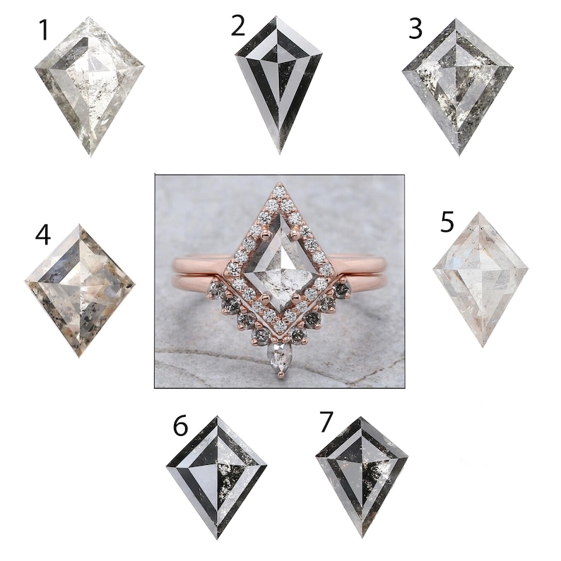 May include: A collection of diamond-shaped gemstones and a rose gold ring with a diamond center stone. The gemstones vary in color, from clear to gray, with visible inclusions. The ring features a halo of smaller diamonds and a unique band design.