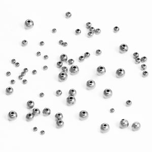 1 Box About 100pcs 5 Sizes 3-8mm Oval & Round Spacer Beads Stainless Steel Loose Beads Corrugated Bead Findings for DIY Jewelry Making Stainless Steel Color