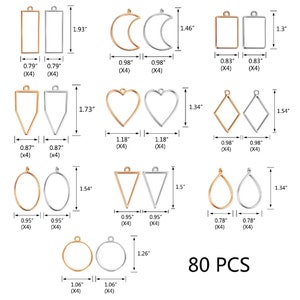 Può includere: Set di 80 vassoi per ciondoli in metallo dorato e argentato in varie forme, tra cui cerchi, ovali, cuori, quadrati, triangoli e lune. I vassoi misurano da 2 a 4,9 cm.