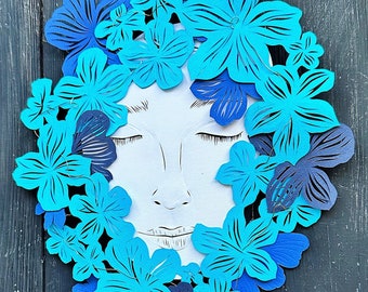 Paper collage art “Face". Original Paper cuting, Cut Artwork Silhouette of a wreath, flowers, around girl face. Decorative wall hanging