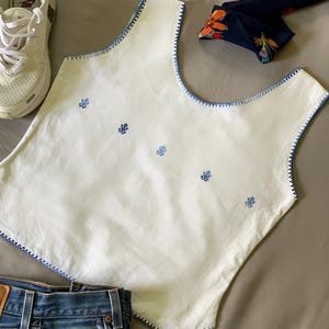 Handmade Mexican Top, this unique garment is embroidered and hand stitched over soft cotton, &quot;Chenalhó Hilo Azúl&quot;