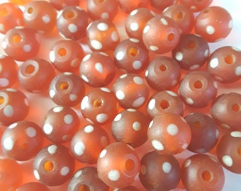 25 Vintage glass beads. Orange lampwork beads with white dots. 10mm x 11mm.