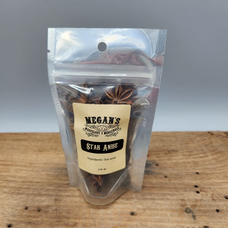 A clear plastic bag filled with brown star anise, with a label that reads "Megan's Marvelous Medicinals Star Anise. Ingredients: Star anise. .5 oz."