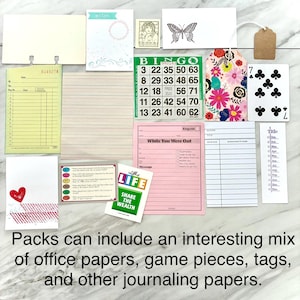 May include: A collection of vintage ephemera, including a bingo card, playing card, tags, and notepaper. The items are in various colors, with floral and butterfly designs. Text on the items includes "Urgent" and "Share the Wealth."