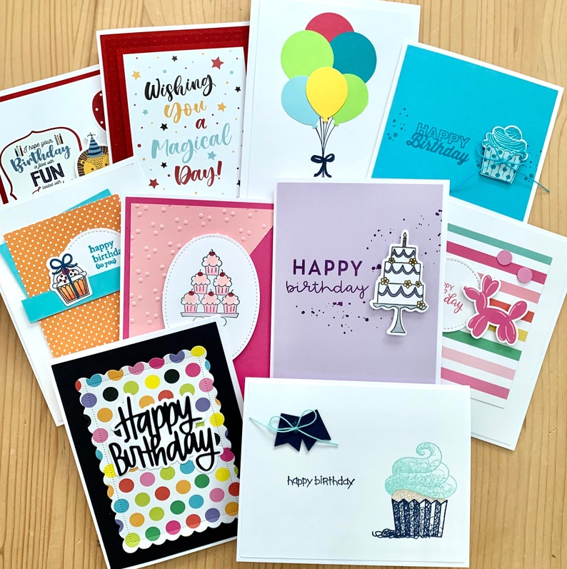 Assortment of Handmade Birthday Cards. Colorful designs featuring cakes, cupcakes, party balloons, and more!  Select from 10, 25, 50, or  100 cards