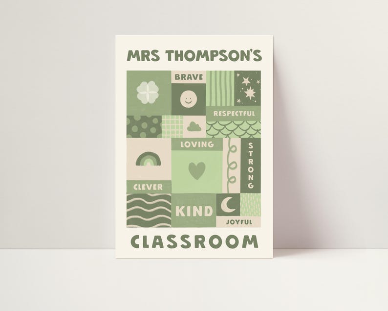 May include: A rectangular poster with a cream background featuring the text MRS THOMPSON'S CLASSROOM in sage green. The center contains a grid of sage green and cream squares with icons like a clover, smiley face, rainbow, heart, and moon, plus words including BRAVE, RESPECTFUL, LOVING, STRONG, CLEVER, KIND, and JOYFUL.