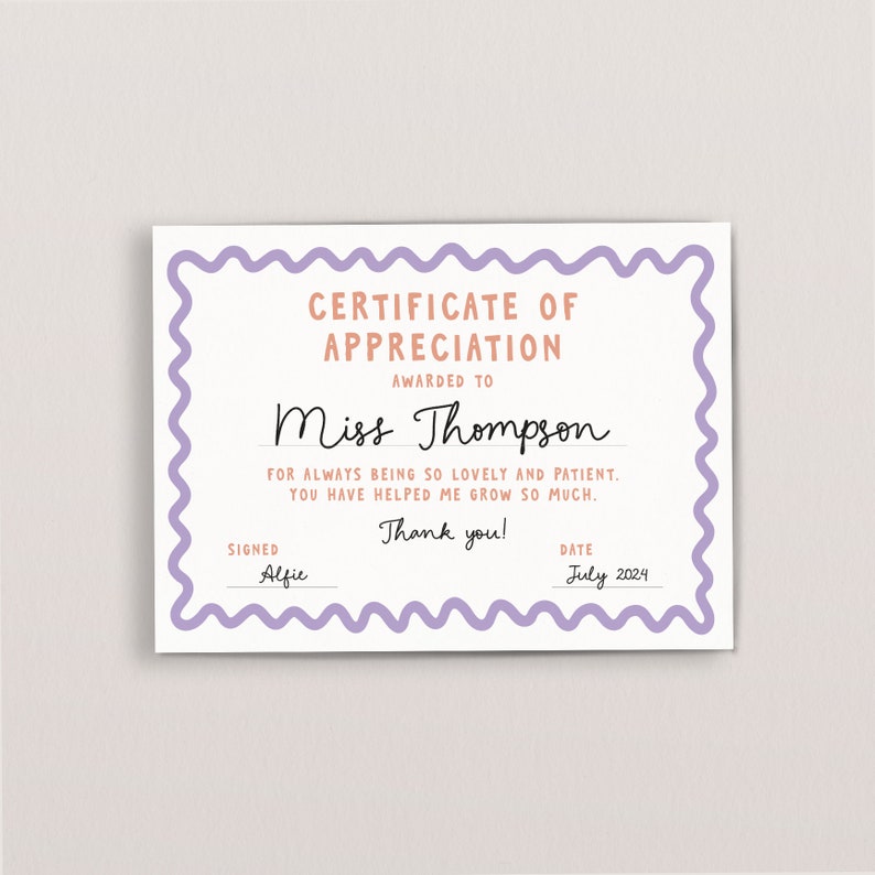 May include: A certificate of appreciation with a purple border, awarded to Miss Thompson for being lovely and patient. The certificate is signed by Alfie and dated July 2024.