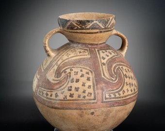 A Classic Chancay Peru, 1110-1470 CE, Spout-and-Handle Jar with Painted Geometric Motifs. # 1782.