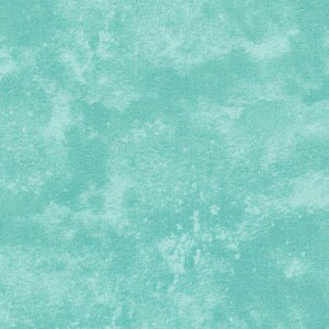 May include: A light blue textured background with a subtle, faded pattern.